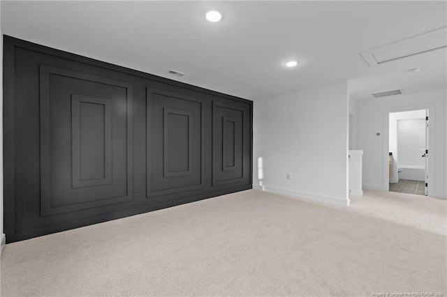 531 Southerland Peak, Raeford, NC 28376 - carpeted spare room featuring attic access, baseboards, visible vents, and recessed lighting