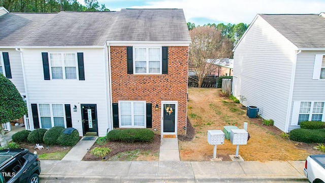 view of front of home with cooling unit