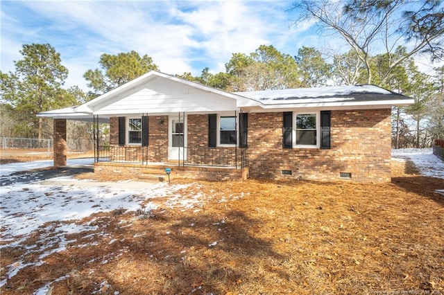 ranch-style home featuring covered porch