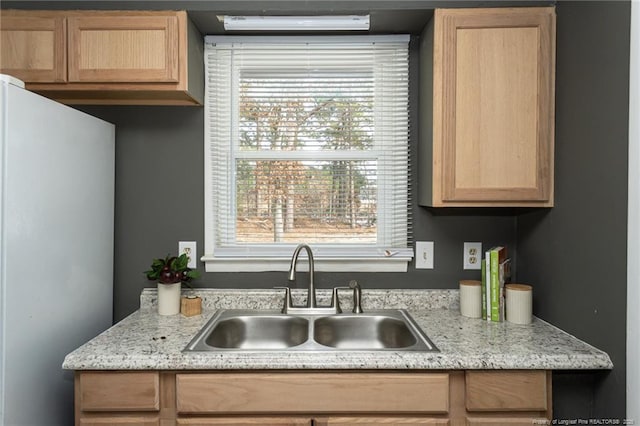 kitchen with fridge and sink