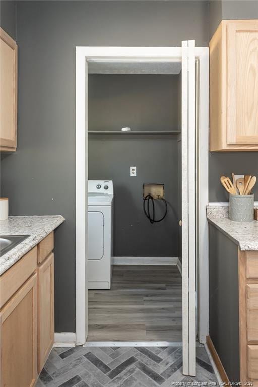 laundry room with washer / dryer