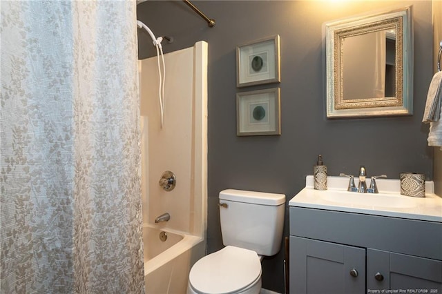 full bathroom featuring vanity, shower / bathtub combination, and toilet