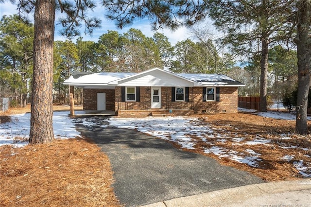 view of front of house with a carport