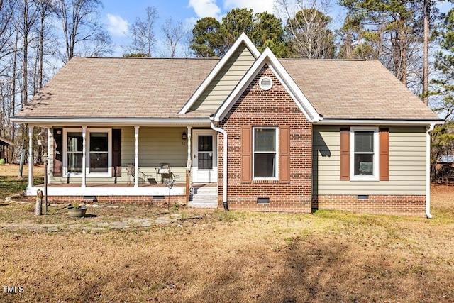 view of front facade with a porch and a front yard