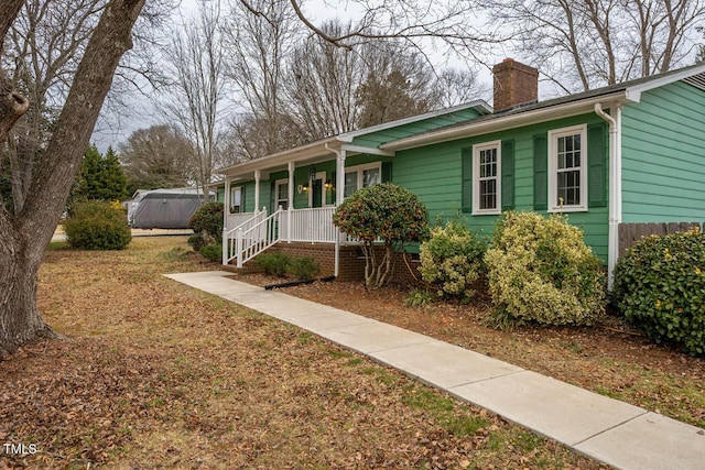 single story home featuring a porch