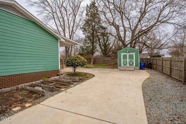 view of patio / terrace featuring a shed