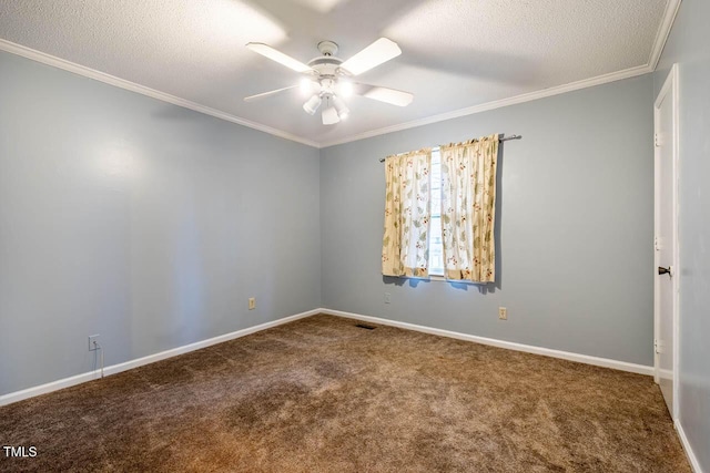 carpeted empty room with ceiling fan, ornamental molding, and a textured ceiling