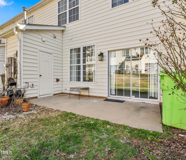 back of property featuring a patio