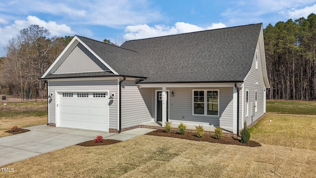 view of front facade featuring a garage and a front lawn