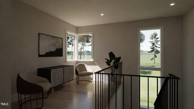 sitting room with hardwood / wood-style flooring