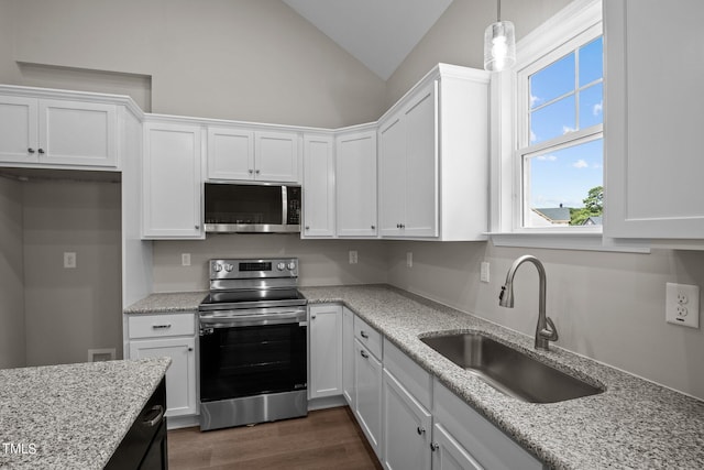 4519 Sweet Williams Ln Unit 153, Wilson, NC 27896 - kitchen featuring sink, decorative light fixtures, stainless steel appliances, light stone countertops, and white cabinets