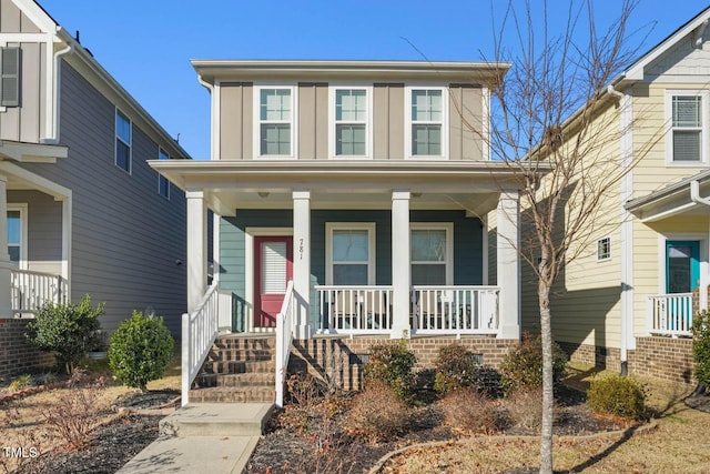 view of front of property featuring covered porch