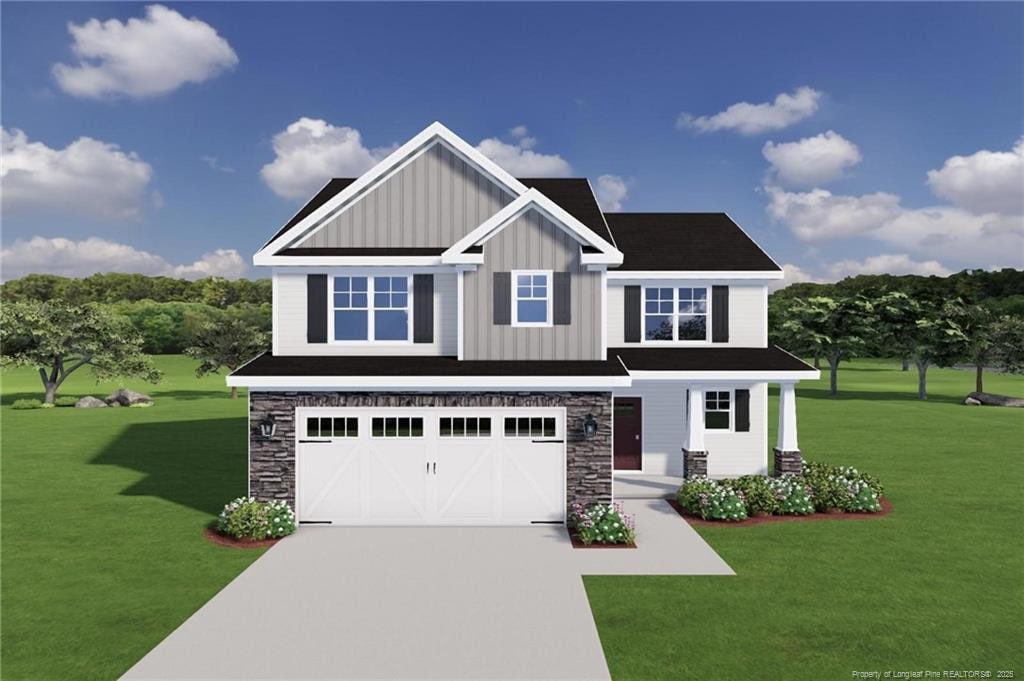 craftsman-style house with a garage and a front yard