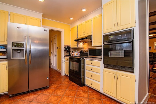 kitchen featuring crown molding, light tile patterned floors, decorative backsplash, and black appliances