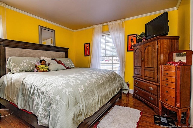 bedroom featuring dark hardwood / wood-style flooring and crown molding