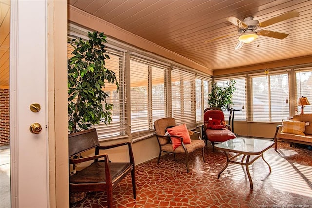 sunroom / solarium with wooden ceiling and ceiling fan