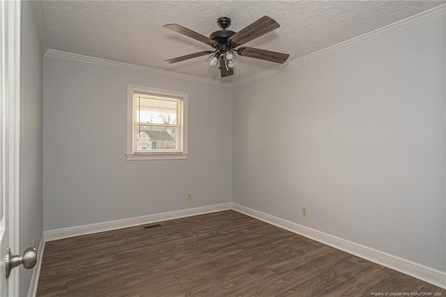 empty room with ceiling fan, crown molding, dark hardwood / wood-style floors, and a textured ceiling