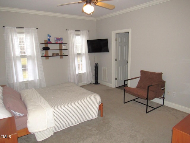 bedroom featuring crown molding, light colored carpet, and ceiling fan