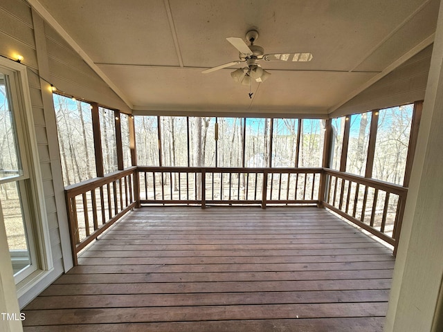 wooden terrace featuring ceiling fan