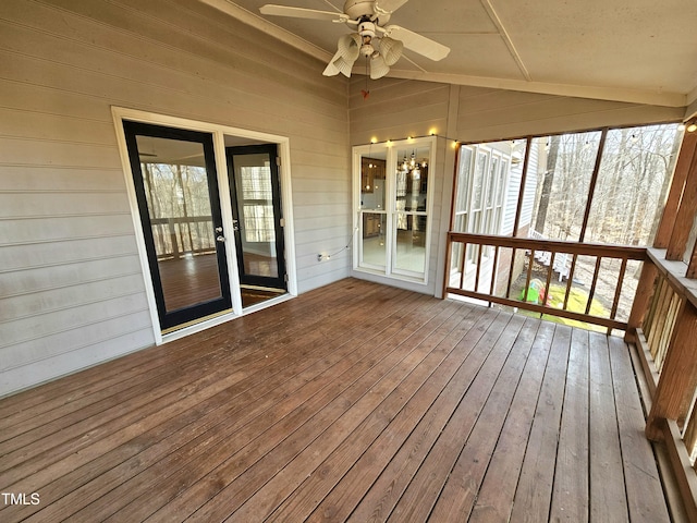 wooden terrace featuring ceiling fan