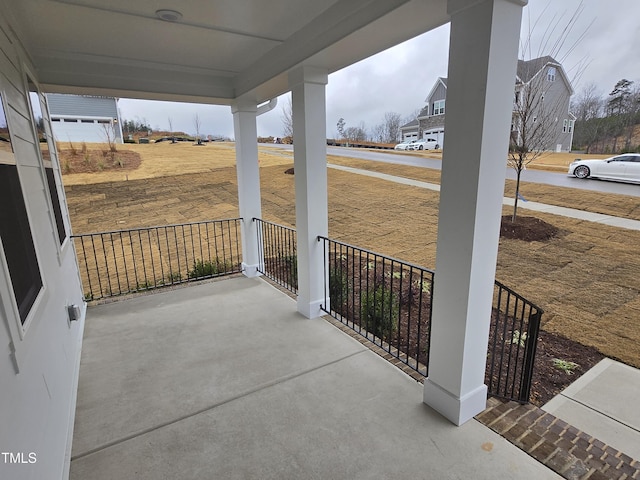 view of patio featuring a porch