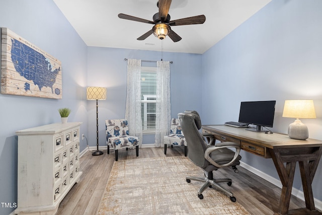 office featuring hardwood / wood-style floors and ceiling fan