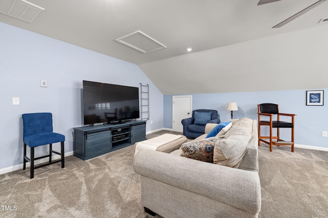 living room with lofted ceiling and light carpet