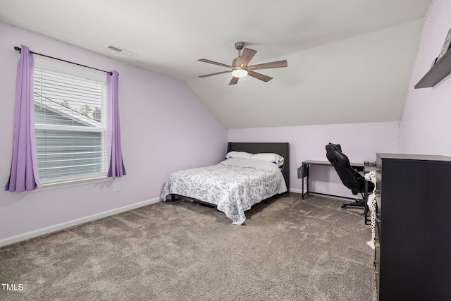 carpeted bedroom with ceiling fan and lofted ceiling