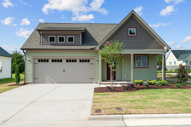 4522 Sweet Williams Ln Unit 163, Wilson, NC 27896 - view of front of house with a garage, a porch, and a front yard