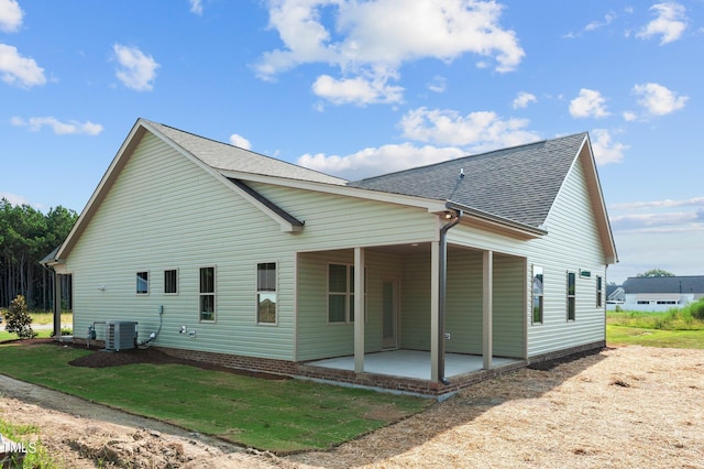 4522 Sweet Williams Ln Unit 163, Wilson, NC 27896 - back of property featuring a yard, central AC, and a patio area