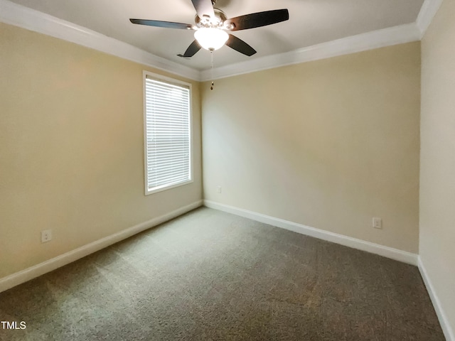 carpeted spare room with ornamental molding and ceiling fan