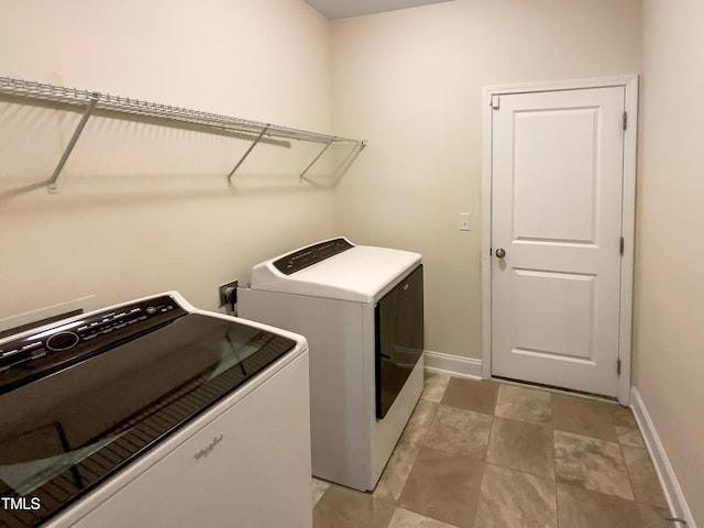 laundry area featuring washer and clothes dryer