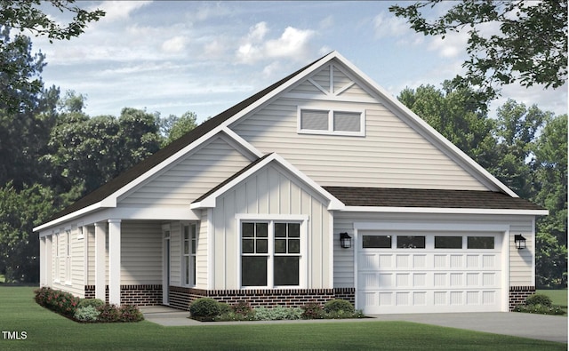 view of front of home featuring a garage and a front yard