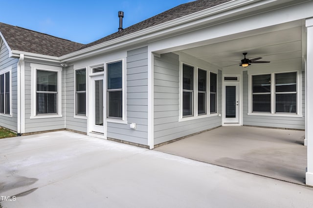 view of patio featuring ceiling fan