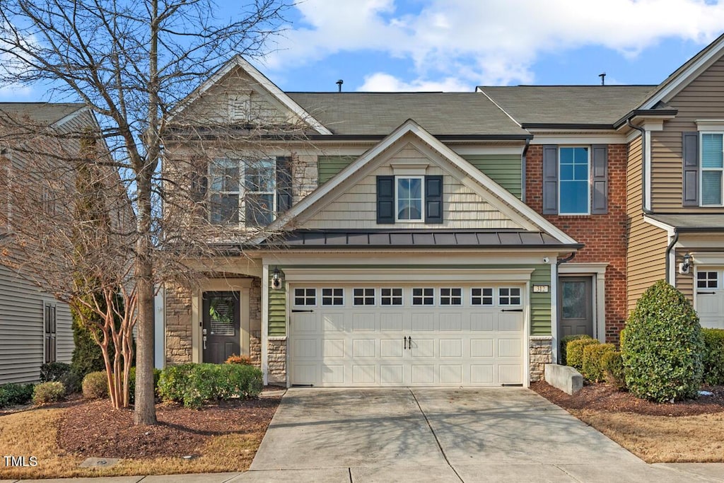 view of front of home with a garage