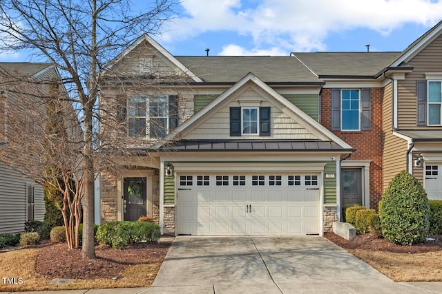 view of front of home with a garage