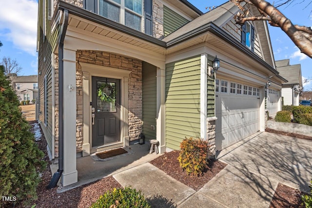 doorway to property featuring a garage