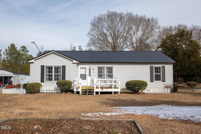 view of front of property with a deck