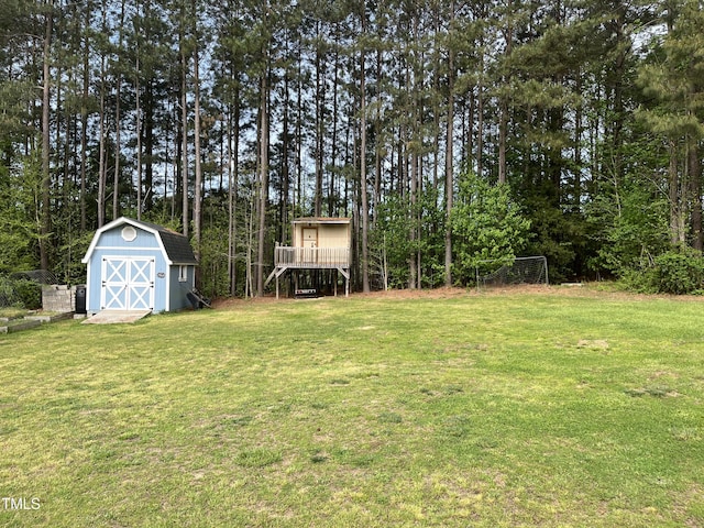 100 Churchill Rd, Louisburg, NC 27549 - view of yard with a shed, stairway, and an outbuilding