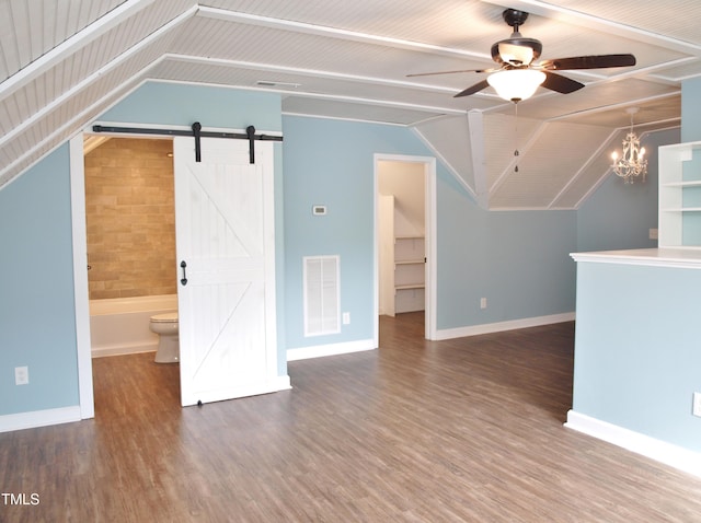 100 Churchill Rd, Louisburg, NC 27549 - bonus room featuring a barn door, visible vents, ceiling fan with notable chandelier, and wood finished floors