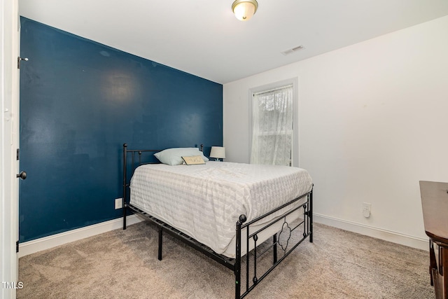 bedroom featuring carpet flooring