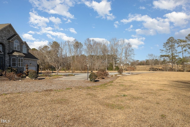 view of yard featuring a garage