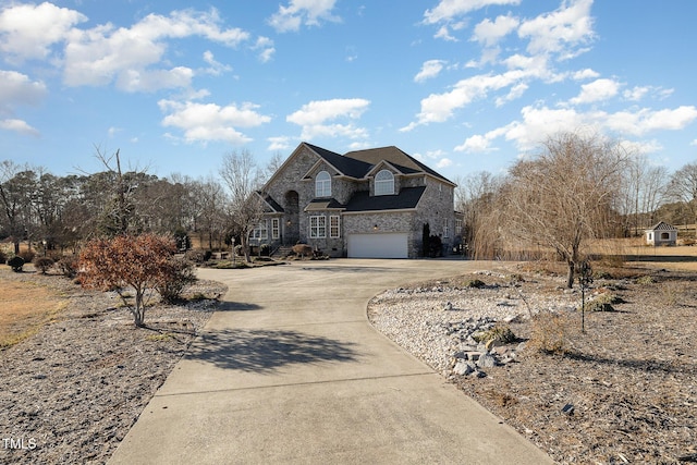 french country inspired facade featuring a garage