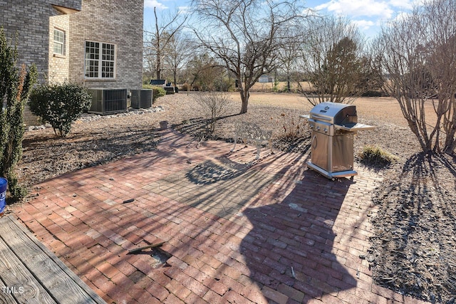 exterior space featuring area for grilling and central air condition unit