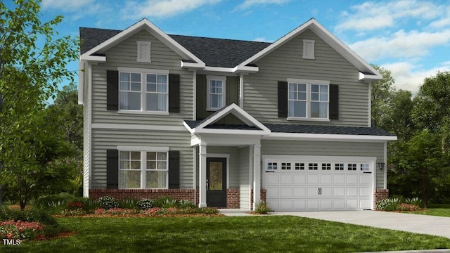 view of front of property featuring a garage and a front yard