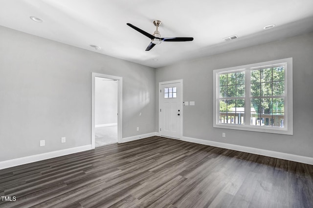 interior space with dark hardwood / wood-style floors and ceiling fan