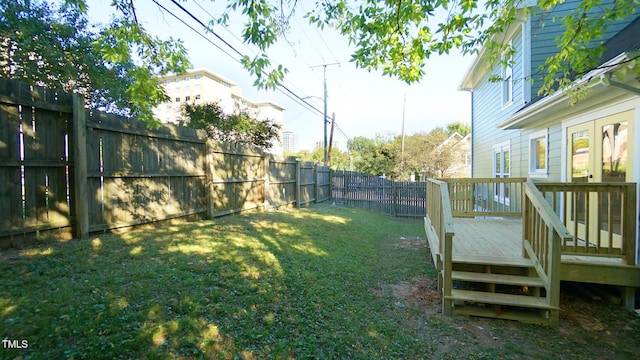 view of yard with a deck