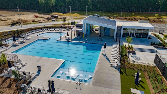 view of swimming pool with a patio area