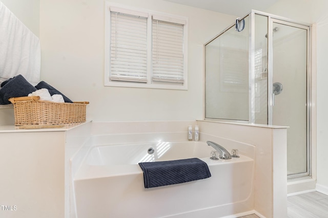 bathroom with independent shower and bath