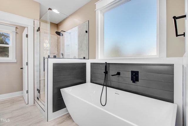 bathroom with independent shower and bath